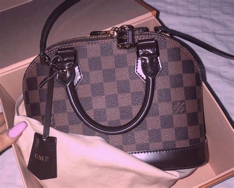 louis vuitton alma epi authentication|false louis vuitton alma bags.